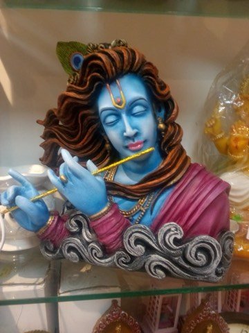 Hand-painted Lord Krishna wall-mount idol with peacock feather